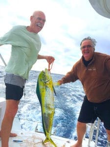 Fishing for mani mani on a cruising catamaran