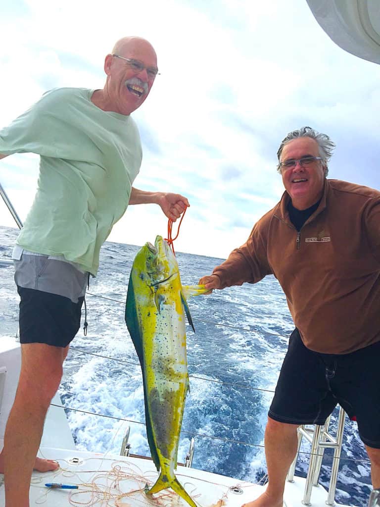 Fishing for mani mani on a cruising catamaran