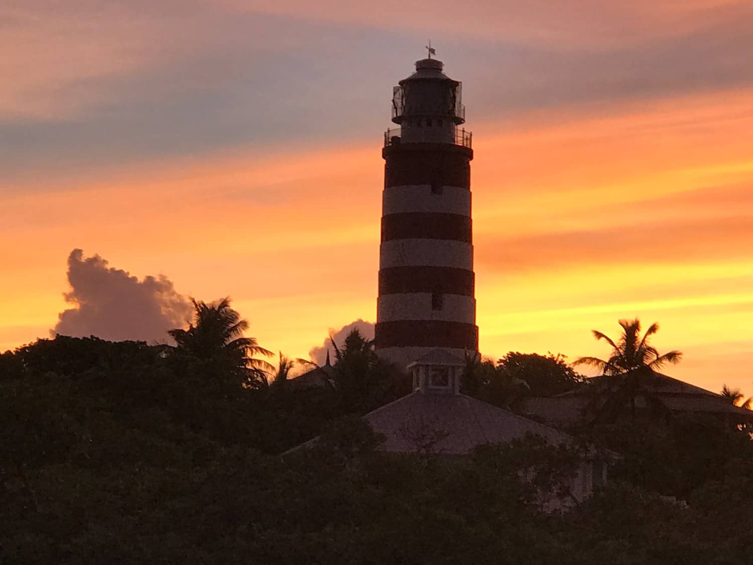 Hopetown lighthouse is a tourist attraction in the abacos of the bahamas