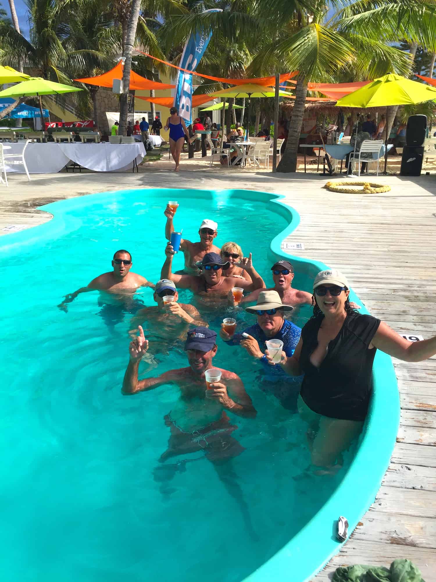 the regatta sailors enjoying drinks and a swim at grabbers on guana island