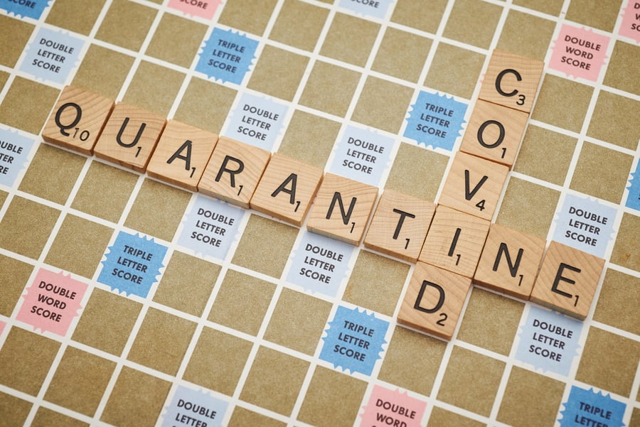 covid and quarantine spelled out on a scrabble board | The Catamaran Gurus covid and quarantine spelled out on a scrabble board